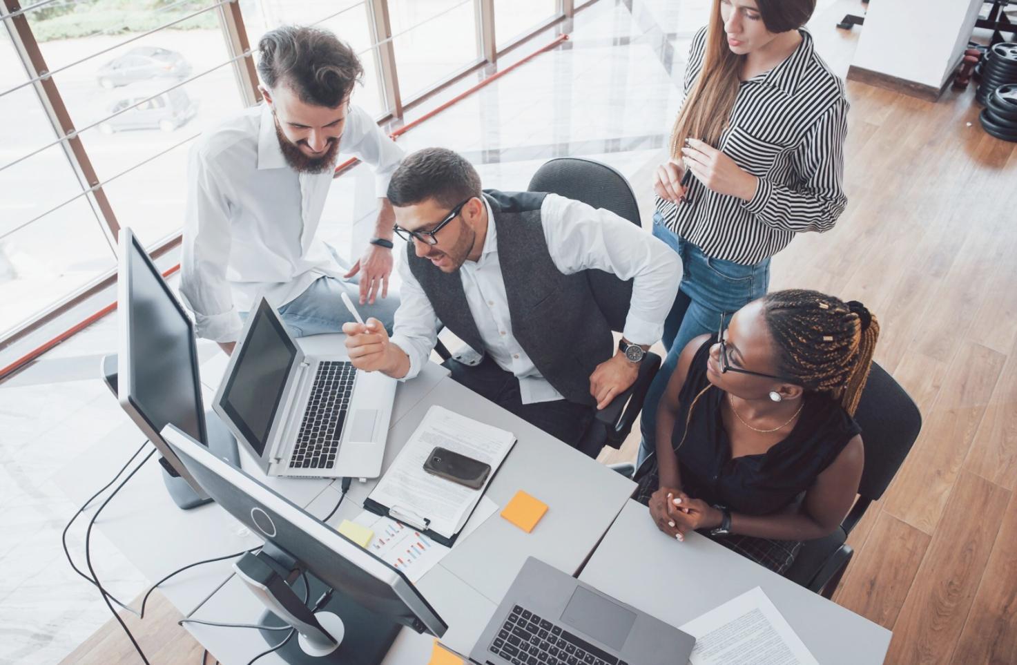 Business professionals collaborating in a workshop setting